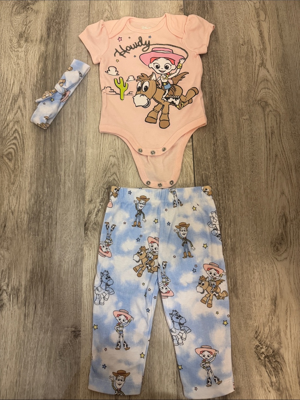 Toy Story 'Howdy' Jessie Peachy Pink One-Piece & Blue Pants Set - Baby